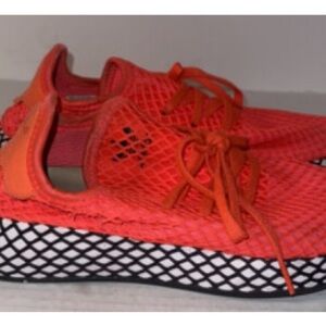 Adidas Black and Orange Athletic Shoes with Breathable Mesh